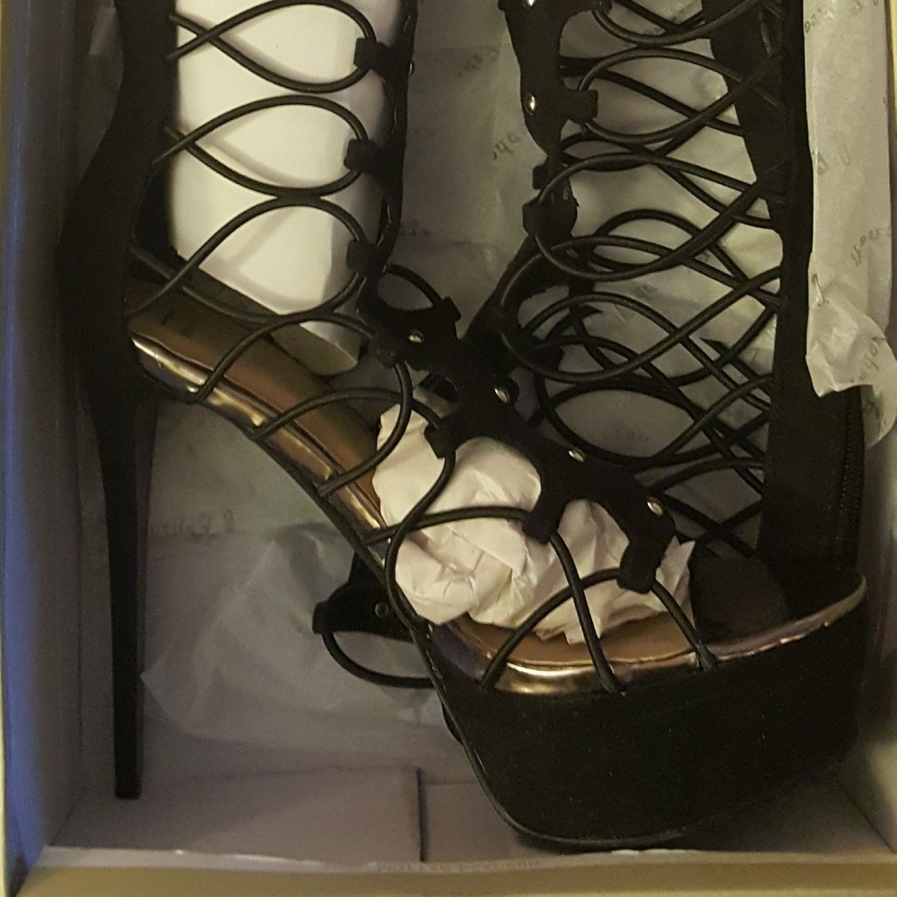 Strappy below the knee heeled sandals